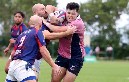 Bermuda punished as Cayman ‘put foot on throat’
