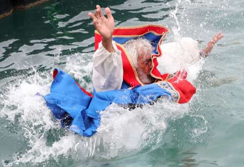 St George’s town crier goes out with a splash