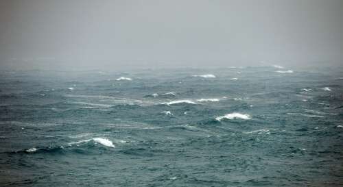 Sailor pulled from yacht after days of rough weather