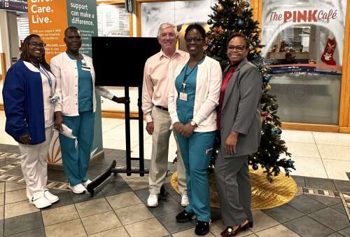 Hospitals Auxiliary donates televisions to KEMH